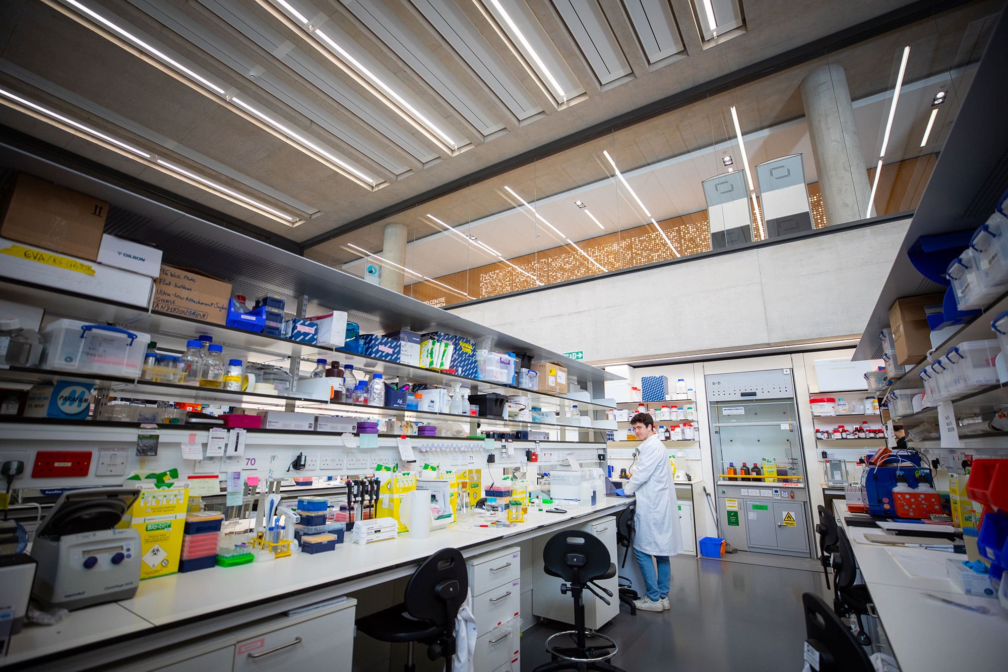 a scientist standing in a lab